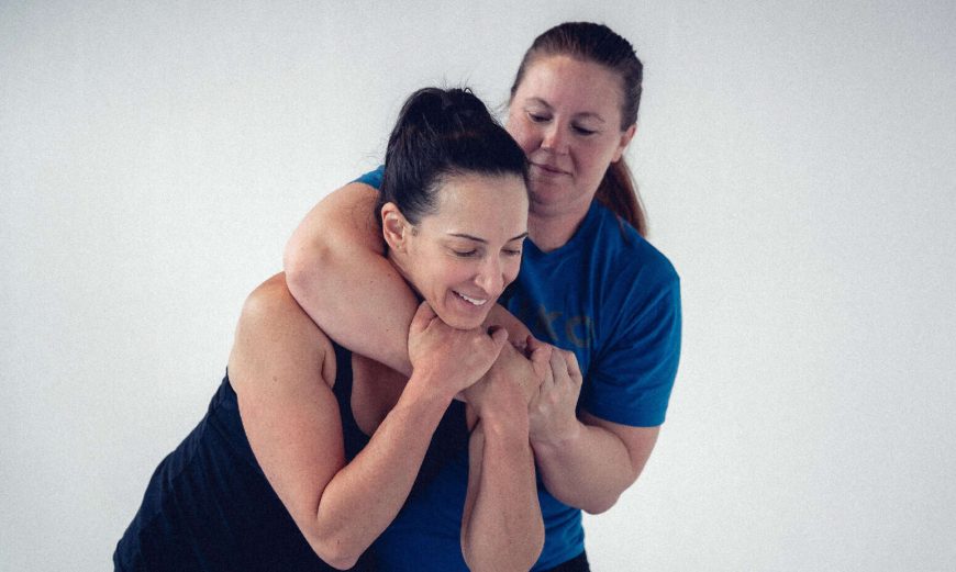 Two women enjoy a self-defense class at Del Mar Jiu-Jitsu Club